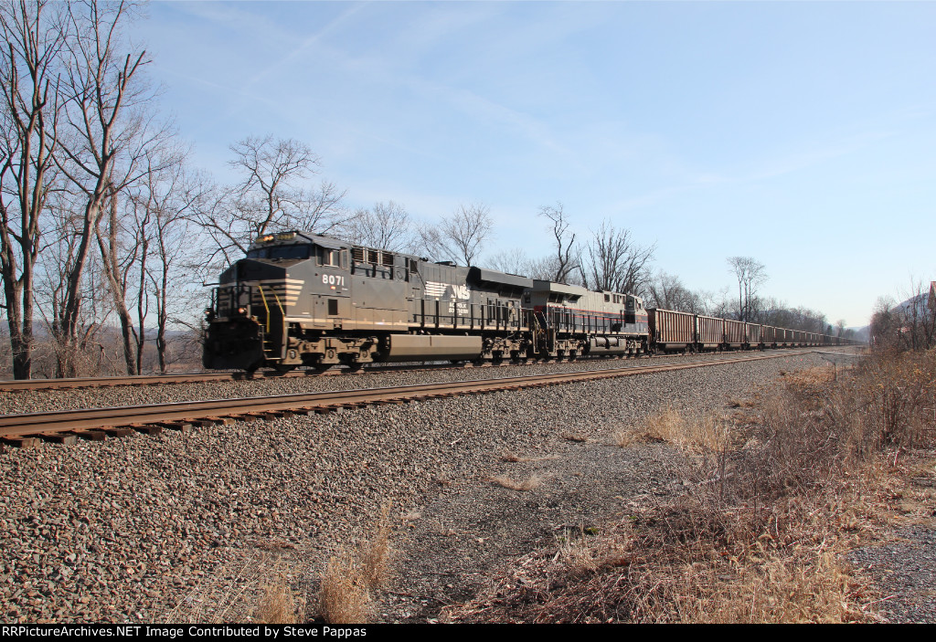NS 8071 leads train 591 with 127 empty coal hoppers